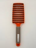 Orange sensory hair brush.