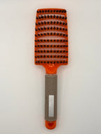 Orange sensory hair brush.