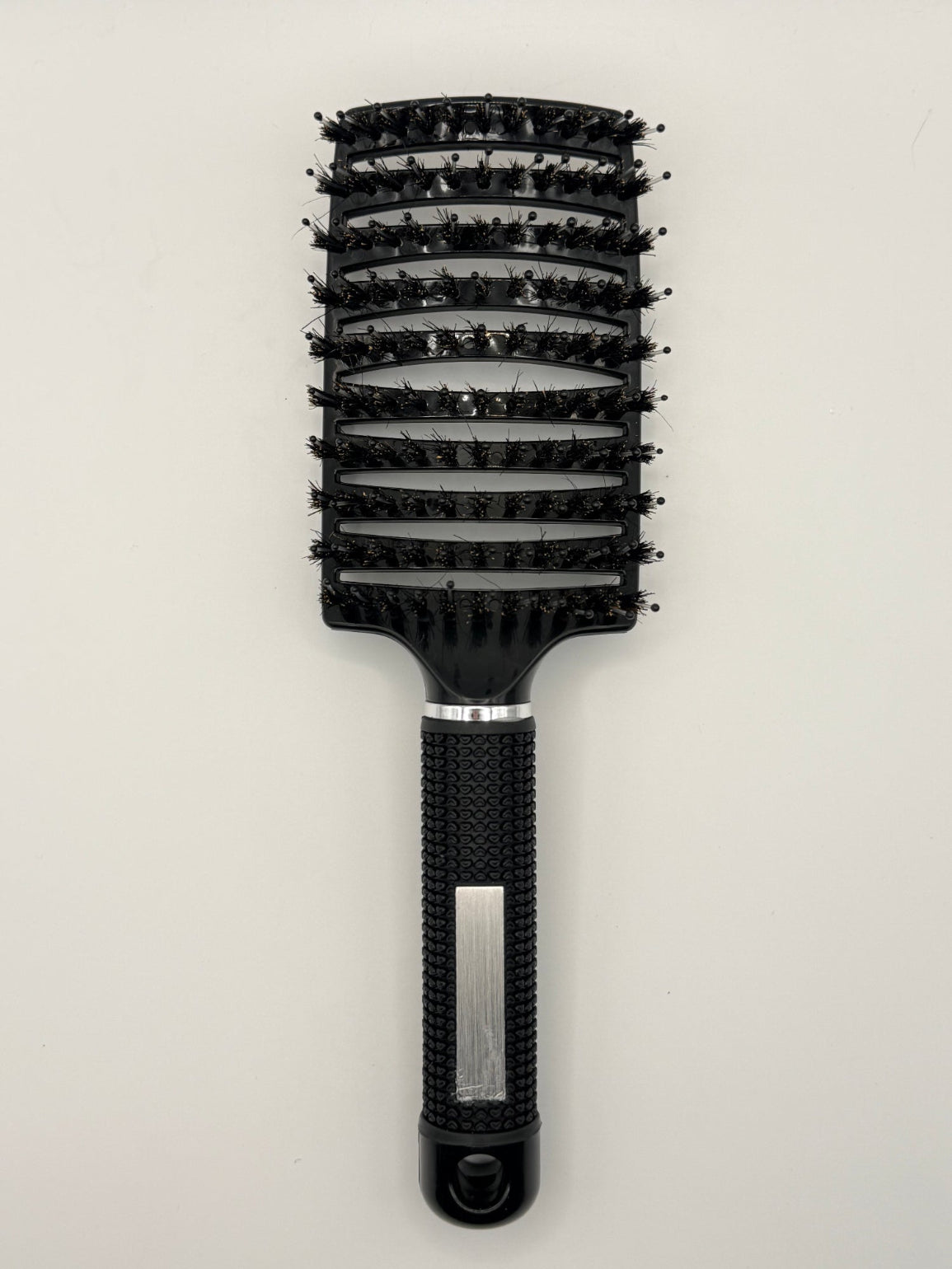 Black sensory hair brush.