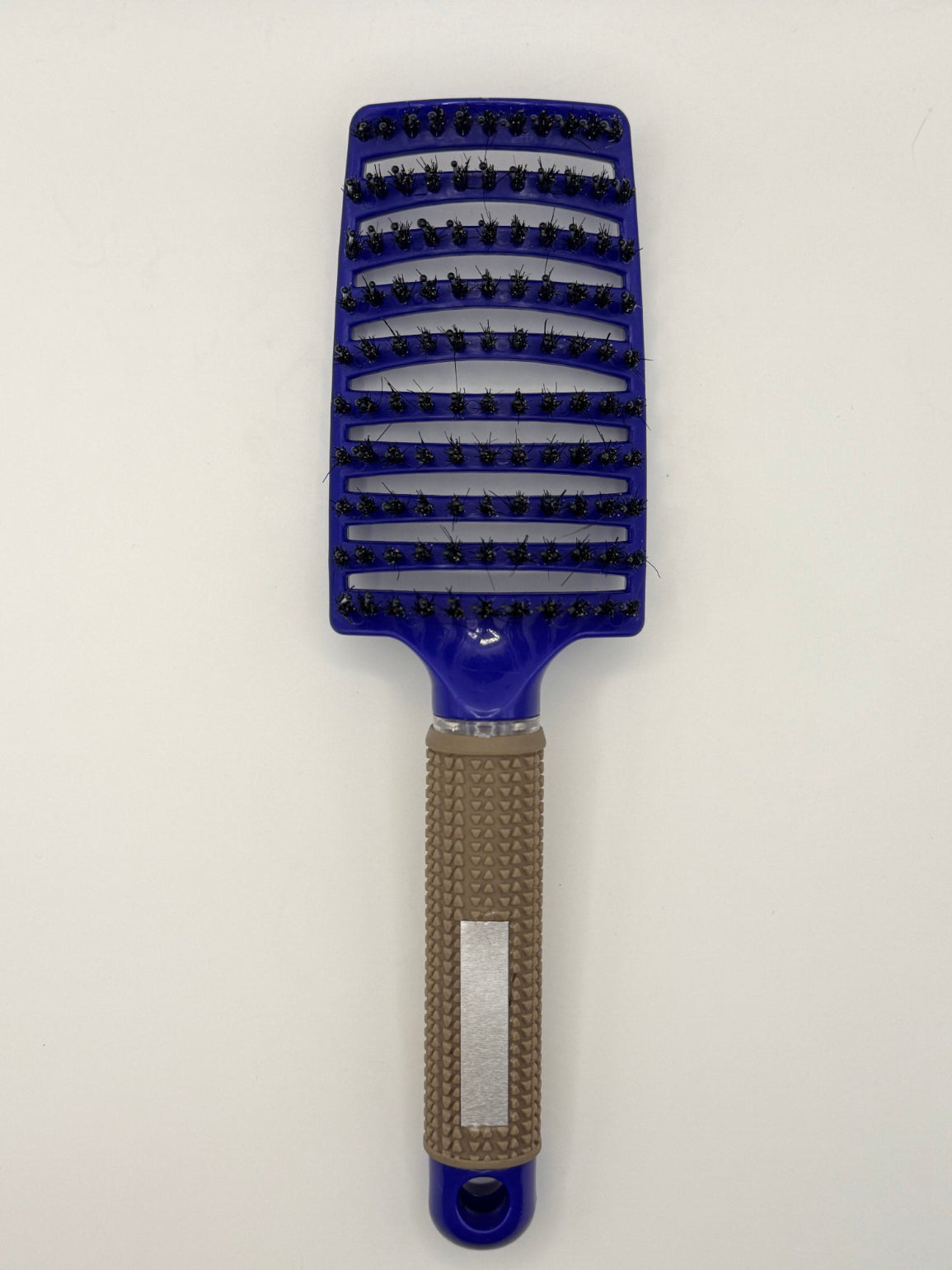 Blue sensory hair brush.