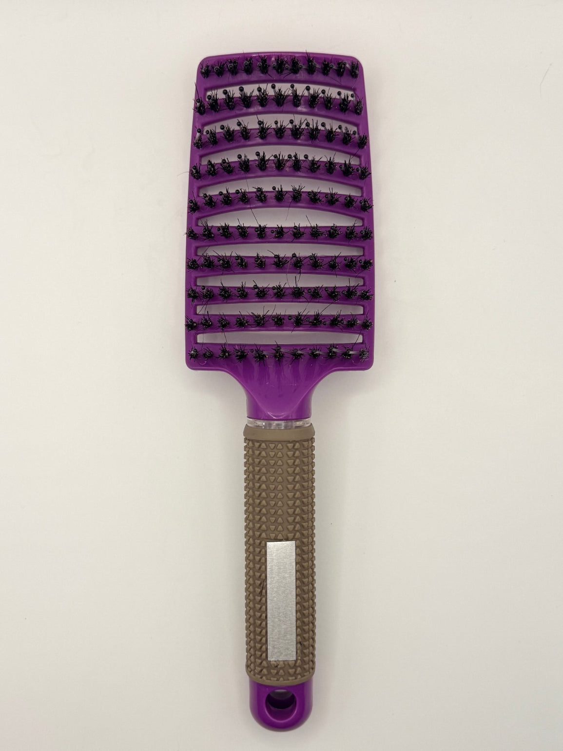 Purple sensory hair brush.