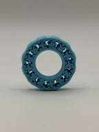 Blue circular ring with a textured surface on a gray background