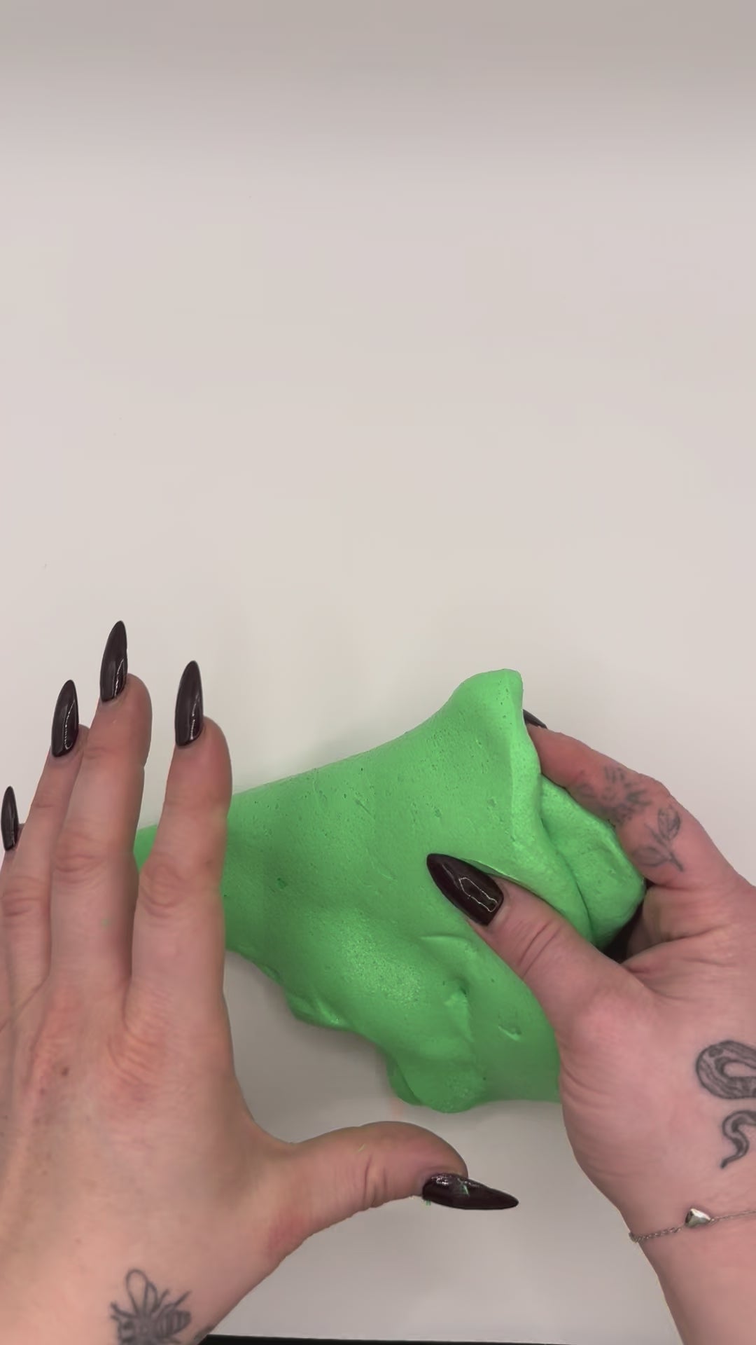 Video of the choc mint ice cream butter slime in hands. 