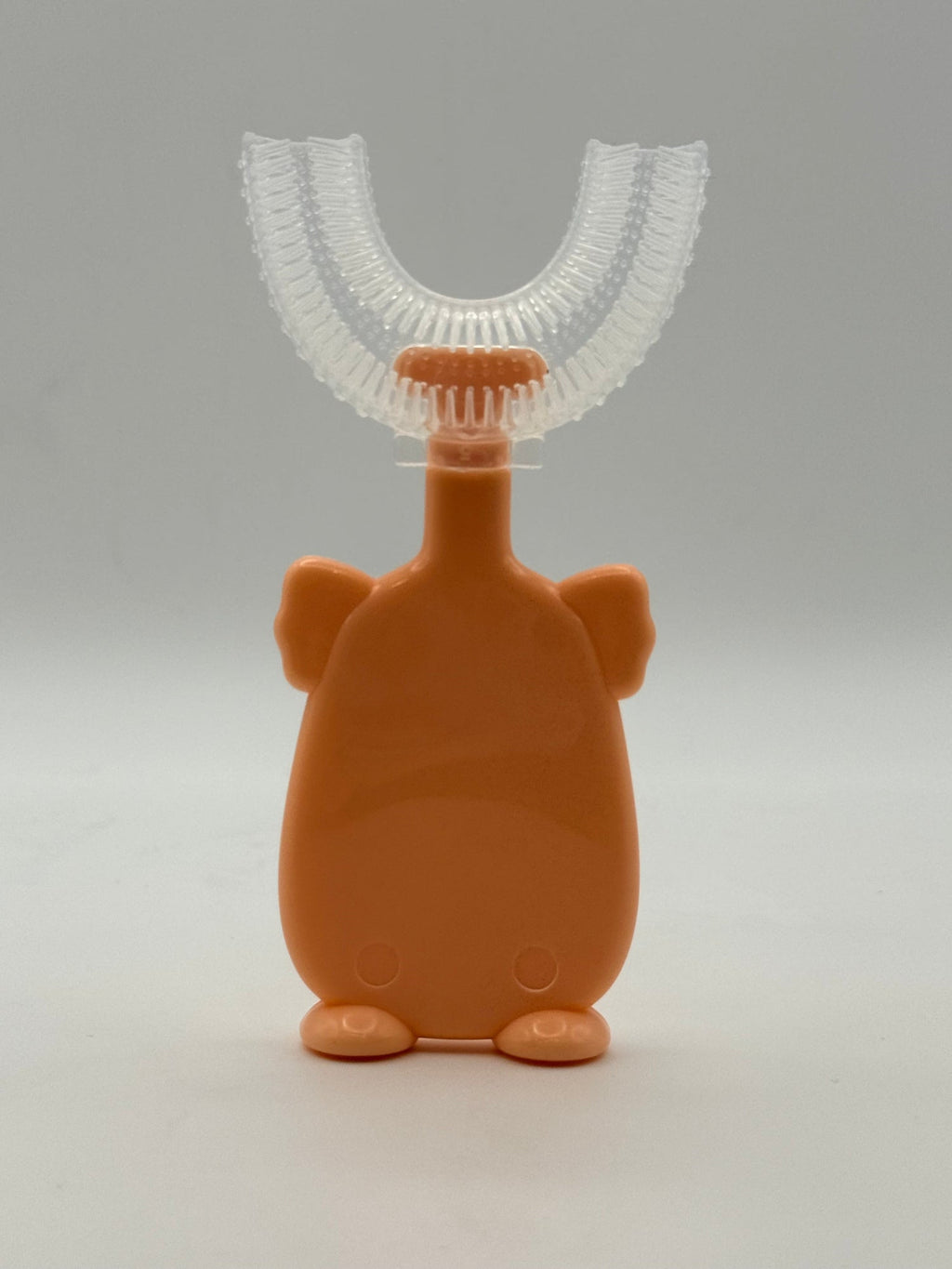 Orange koala U-shape sensory tooth brush rear view.