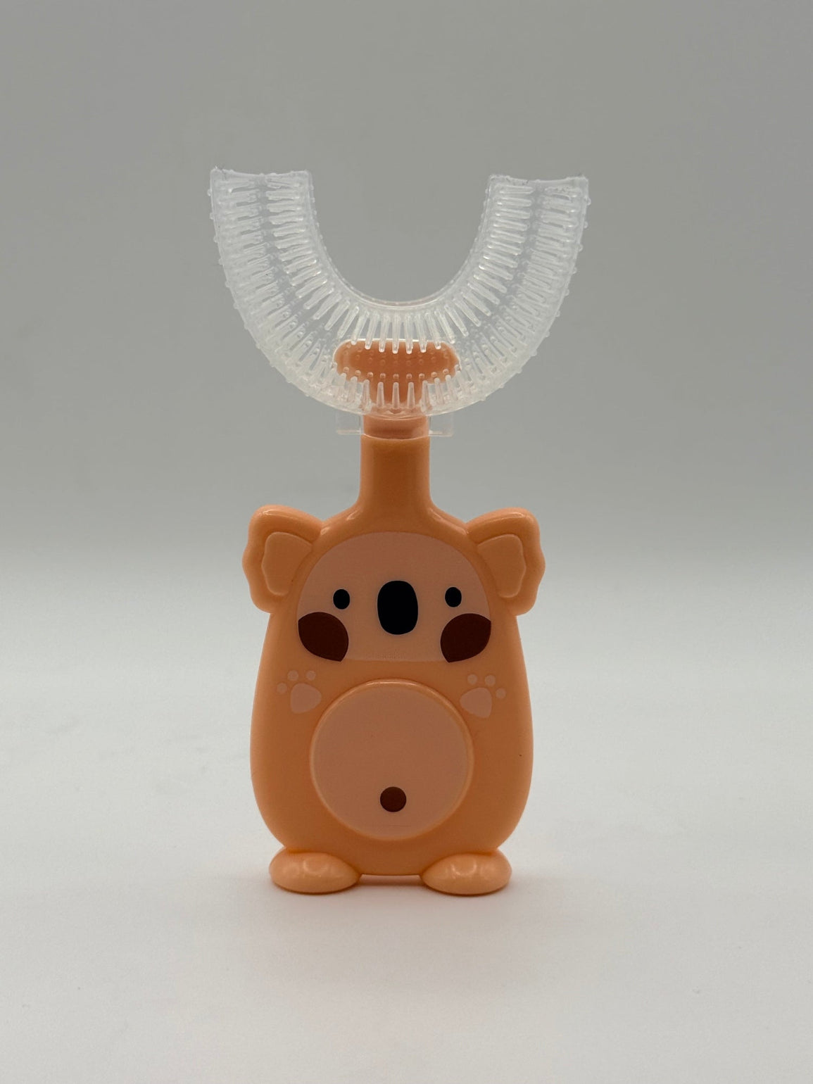 Orange koala U-shape sensory tooth brush front view.